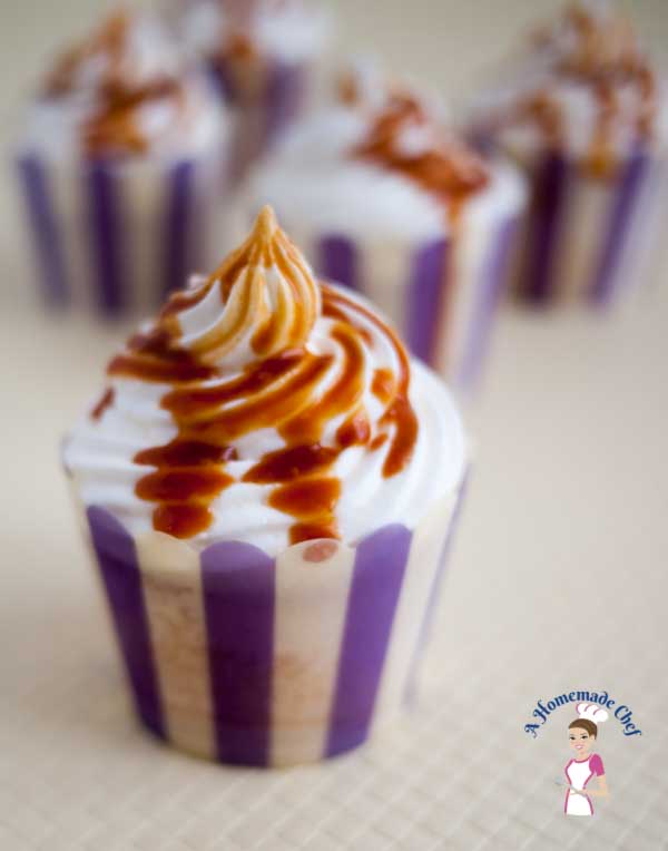 This Caramel Cupcakes recipes is simply the most decadent you can get, with a light and fluffy Vanilla Sponge on the inside; filled with soft sweet caramel, topped with delicious Swiss Meringue Buttercream and then drizzled with some more caramel again by food blog A Homemade Chef. This Caramel Cupcakes recipes is simply the most decadent you can get, with a light and fluffy Vanilla Sponge on the inside; filled with soft sweet caramel, topped with delicious Swiss Meringue Buttercream and then drizzled with some more caramel again by food blog A Homemade Chef.