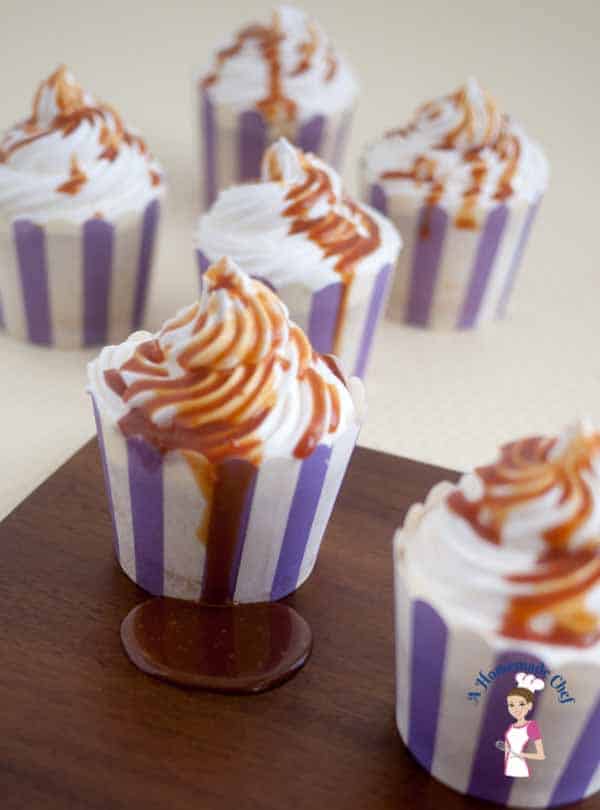 This Caramel Cupcakes recipes is simply the most decadent you can get, with a light and fluffy Vanilla Sponge on the inside; filled with soft sweet caramel, topped with delicious Swiss Meringue Buttercream and then drizzled with some more caramel again by food blog A Homemade Chef. This Caramel Cupcakes recipes is simply the most decadent you can get, with a light and fluffy Vanilla Sponge on the inside; filled with soft sweet caramel, topped with delicious Swiss Meringue Buttercream and then drizzled with some more caramel again by food blog A Homemade Chef.