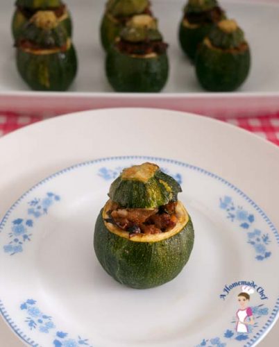 These meat stuffed zucchini pots is a simple easy and delicious recipe with the combination of meat and vegetables. This is a great make ahead dish if you plan to serve for a party. Plus they looks absolutely gorgeous on the dinner table. By food blog A Homemade Chef