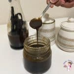 A mason jar with vanilla bean paste