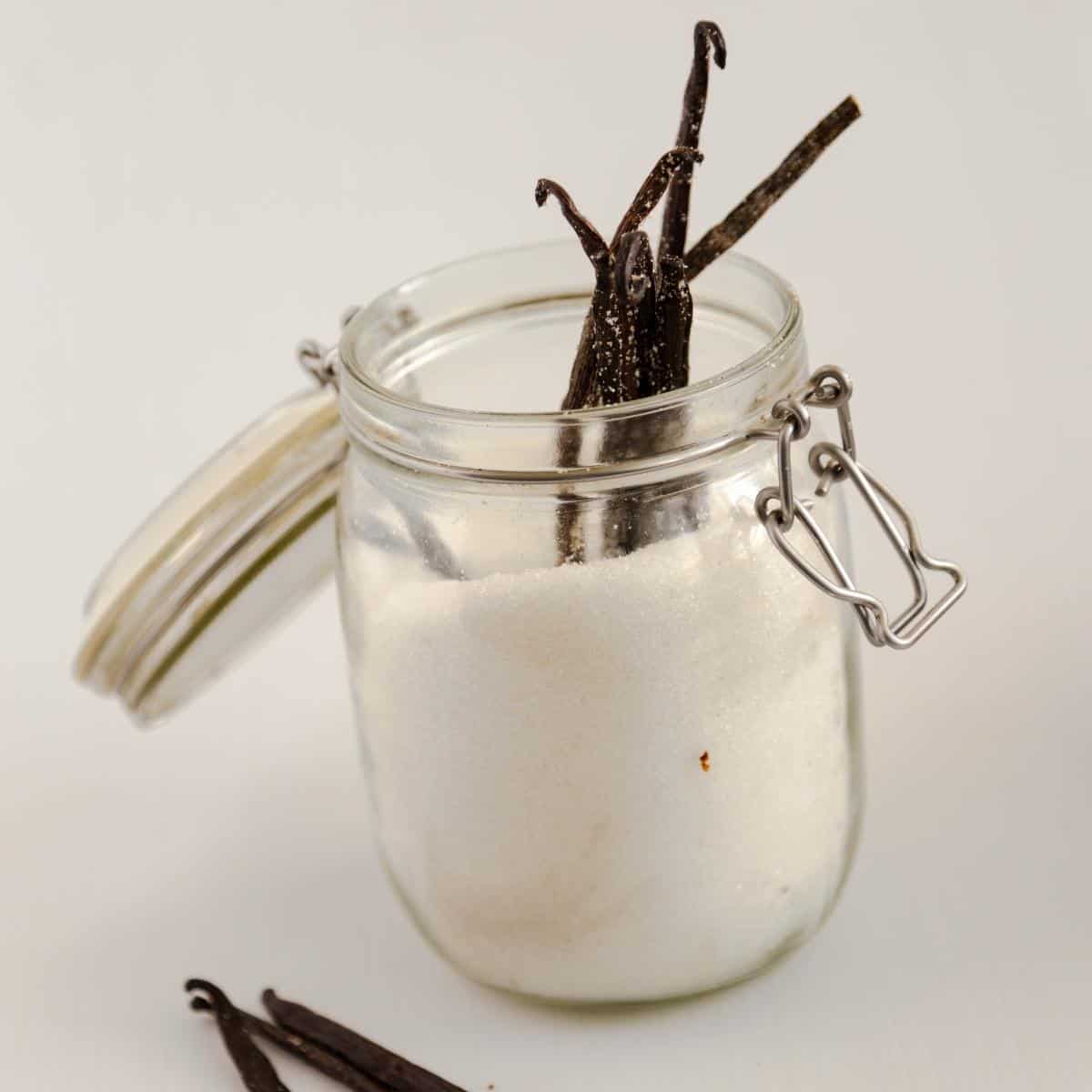 A sugar jar with vanilla beans