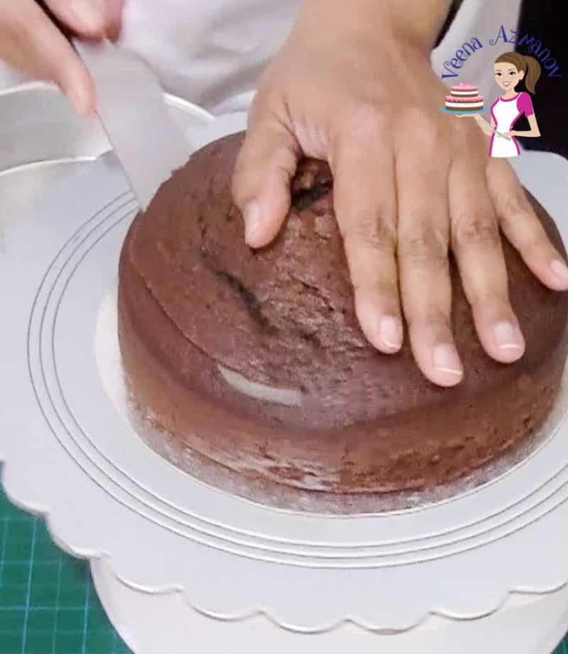 Progress Pictures for this video tutorial with progress pictures for how to ganache a cake perfectly every single time.