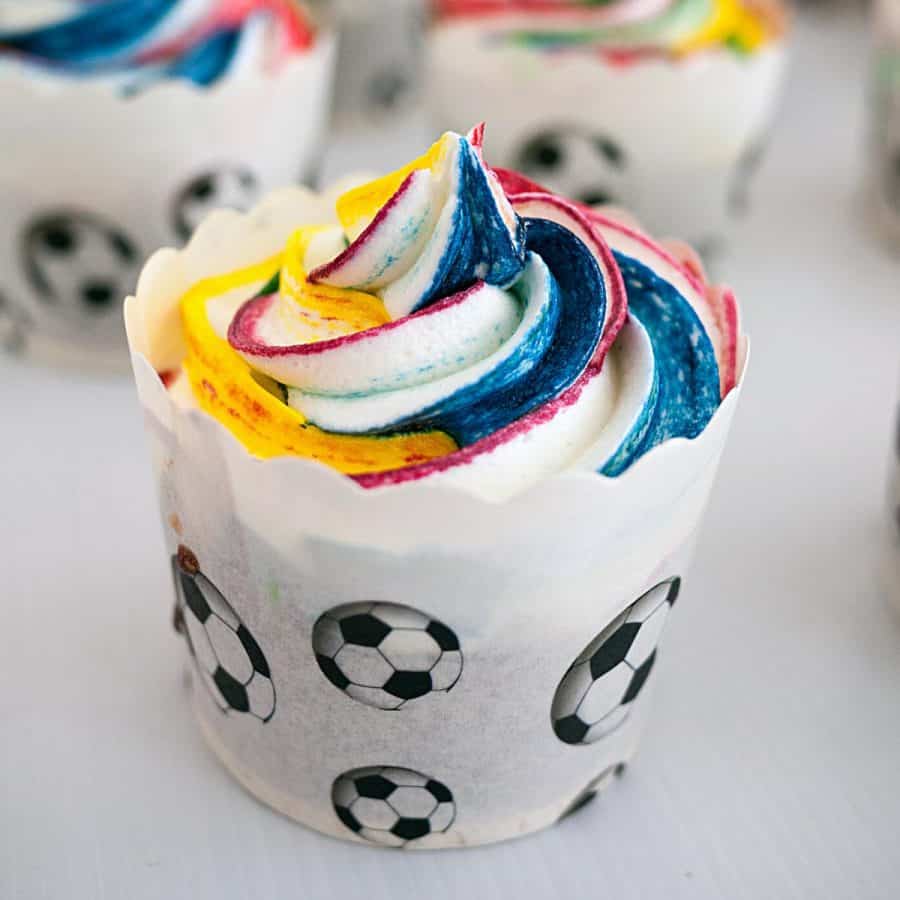 A frosted cupcake buttercream with IMBC with meringue.