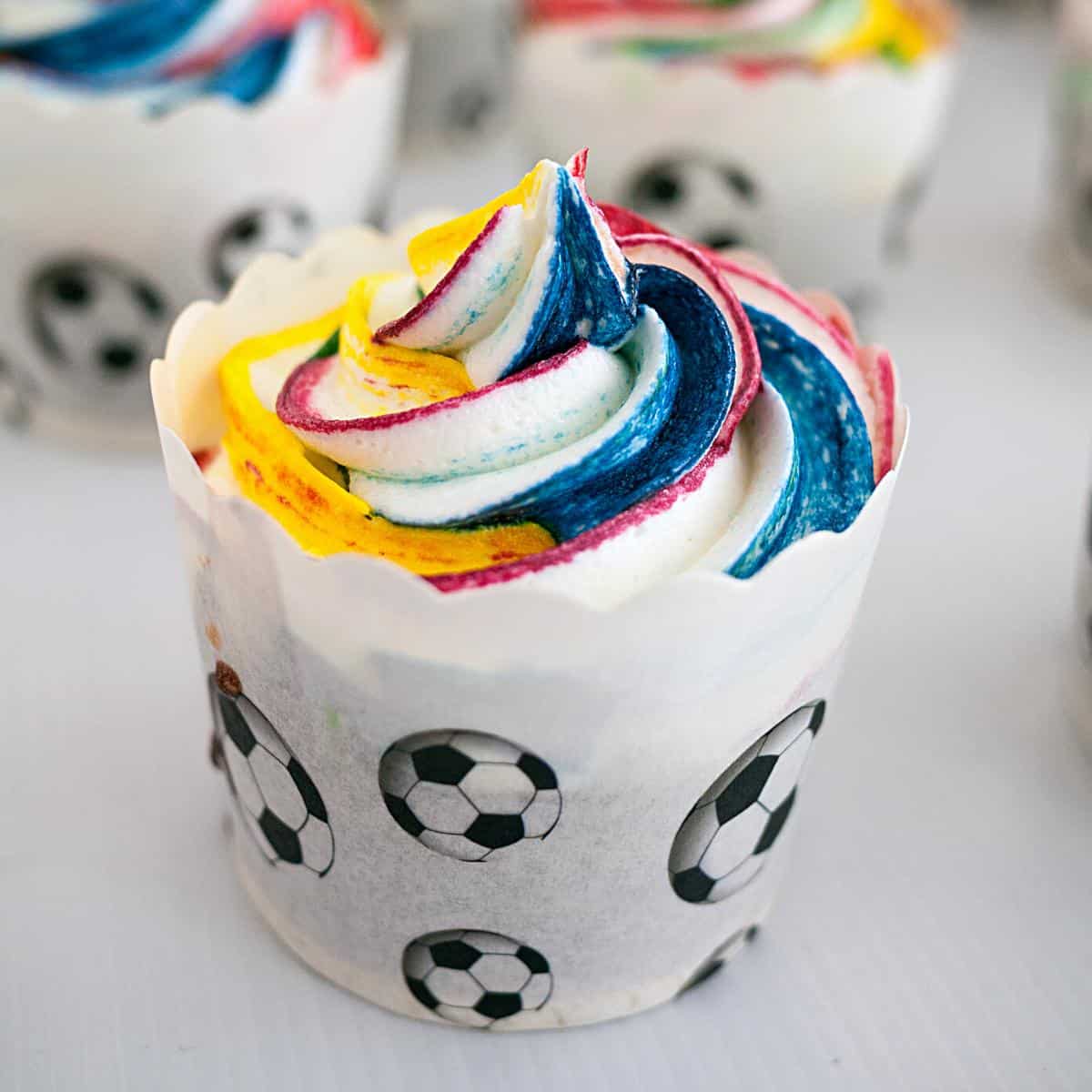 A frosted cupcake buttercream with IMBC with meringue.