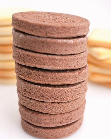 A stack of sugar cookies on the table.