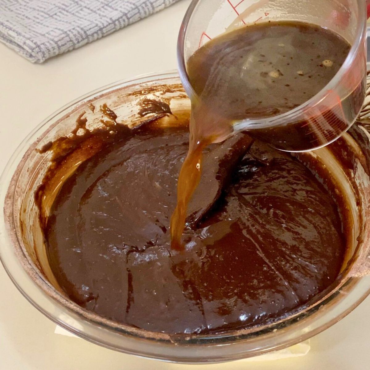 Progress pictures adding coffee to chocolate batter.