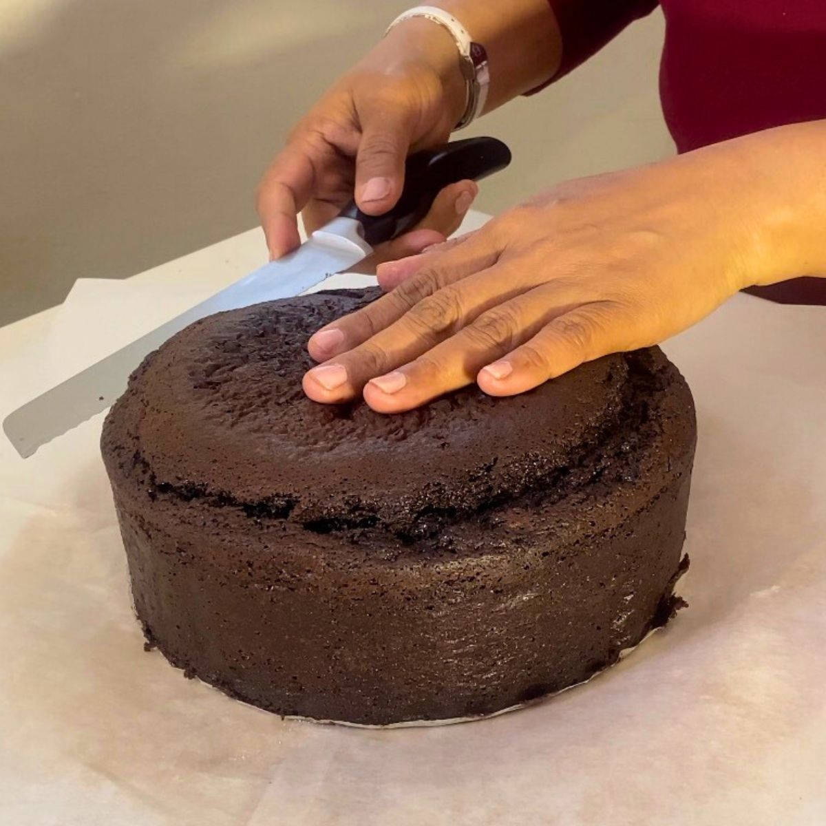 Cutting the dome chocolate mud cake progress pictures.
