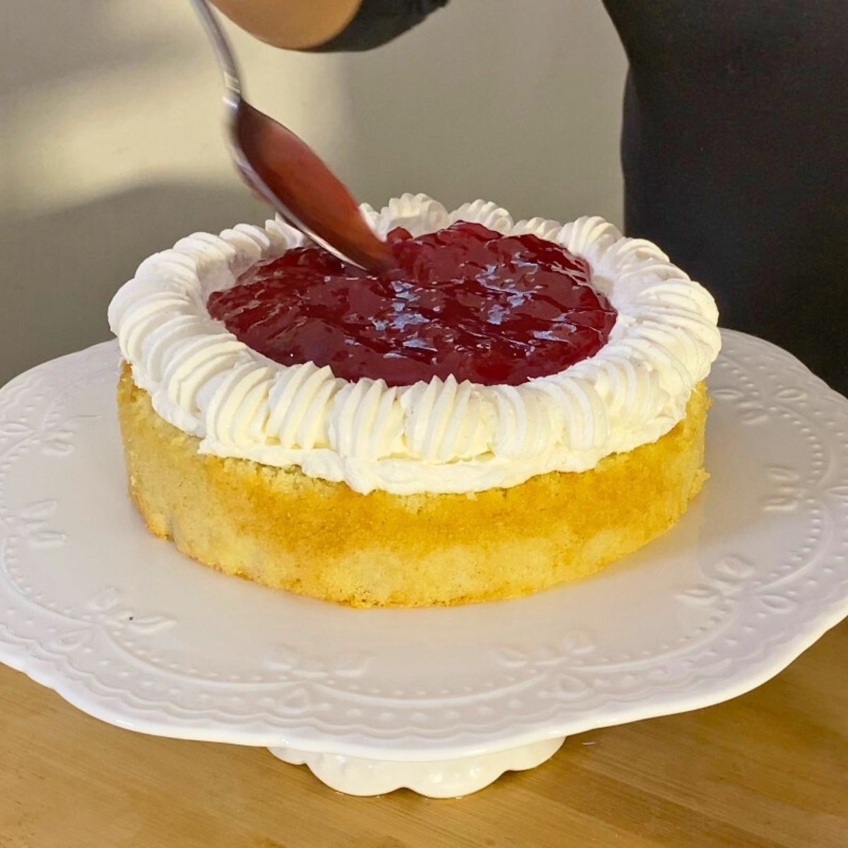 A Cake with jam filling in Buttercream.