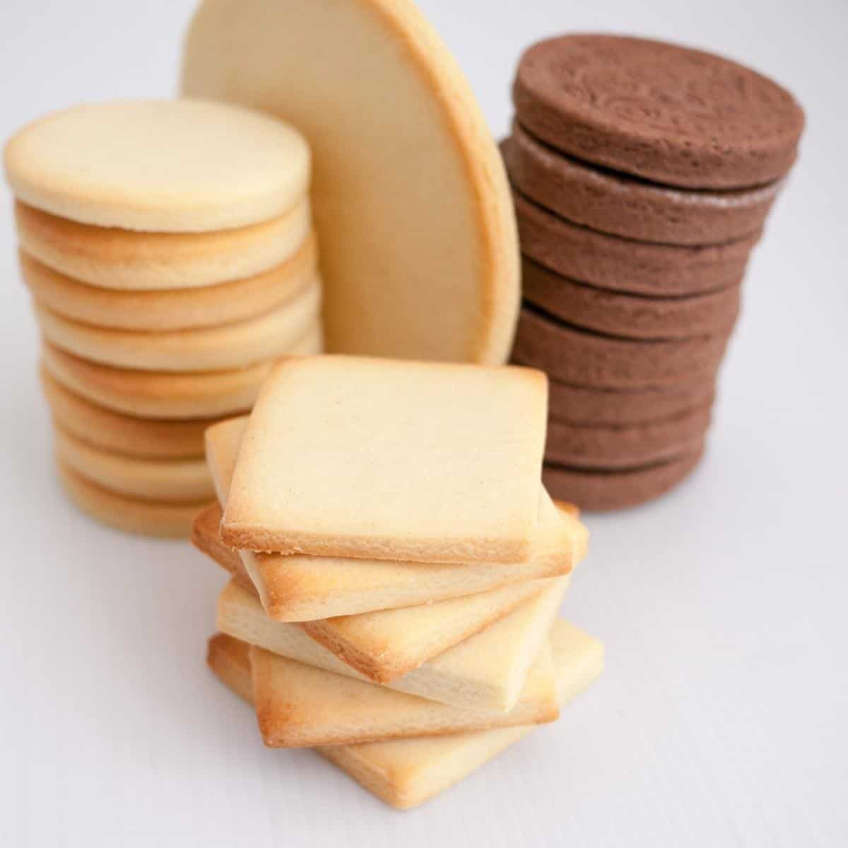 A stack of vanilla and chocolate sugar cookies.