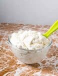 My velvet American buttercream is the most requested recipe from customers as well as here on the blog. It has a glossy sheen due to the unique method I use in making it. This simple, easy and effortless recipe makes a delicious velvety smooth textured buttercream that's not grainy, easy to make in minutes, and melts in the mouth.