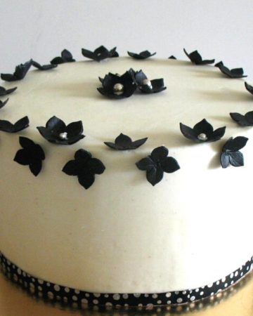 A buttercream frosted cake with American buttercream.