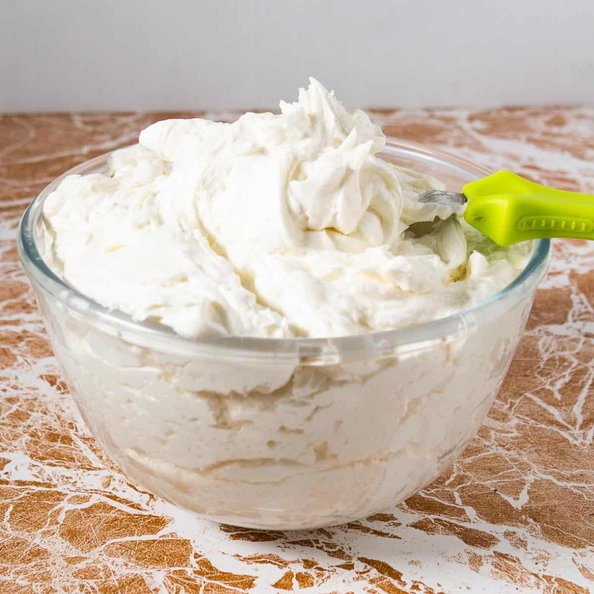 A bowl with buttercream frosting.