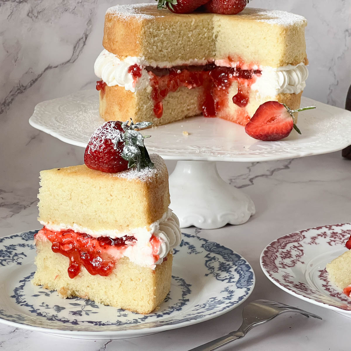 Sliced Victoria Sponge Cake on the Cake Stand.