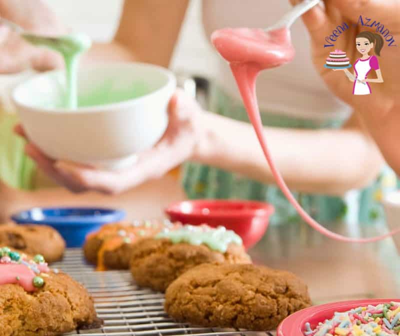 Decorating cookies with icing.