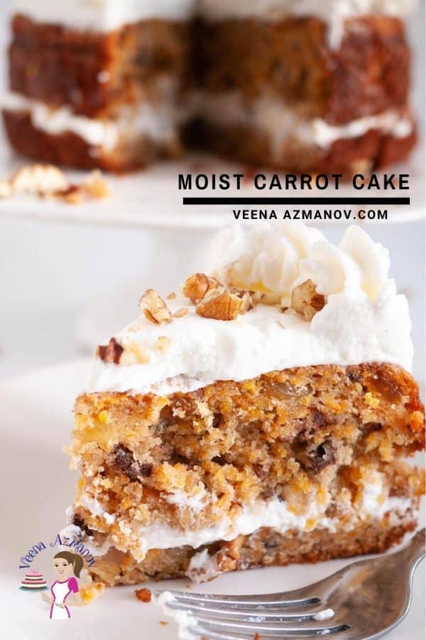 A slice of moist carrot cake with cream cheese frosting.