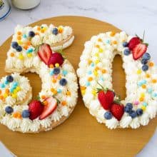 A number 50 cake on the cake board.