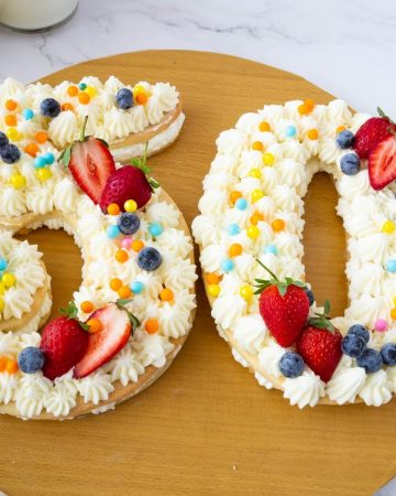 A number 50 cake on the cake board.