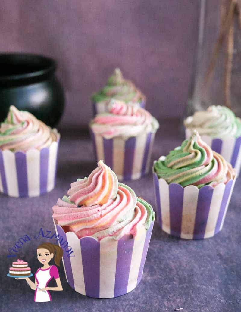 Vanilla sour cream cupcakes with colorful frosting.