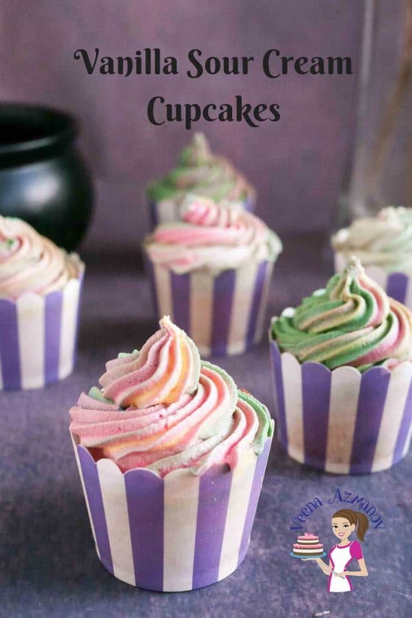 Vanilla sour cream cupcakes with colorful frosting.