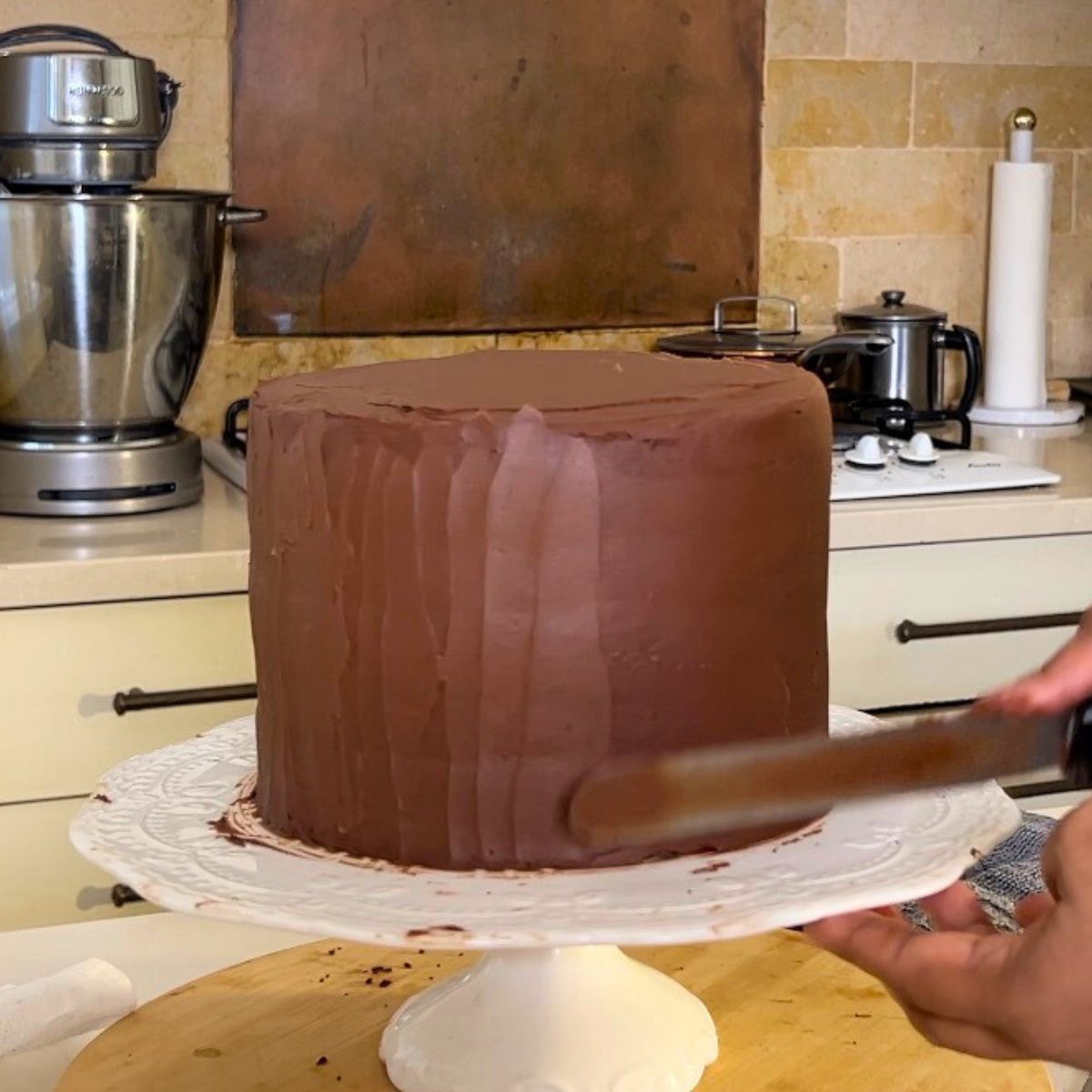 Creating spatula texture on the devil's food cake.