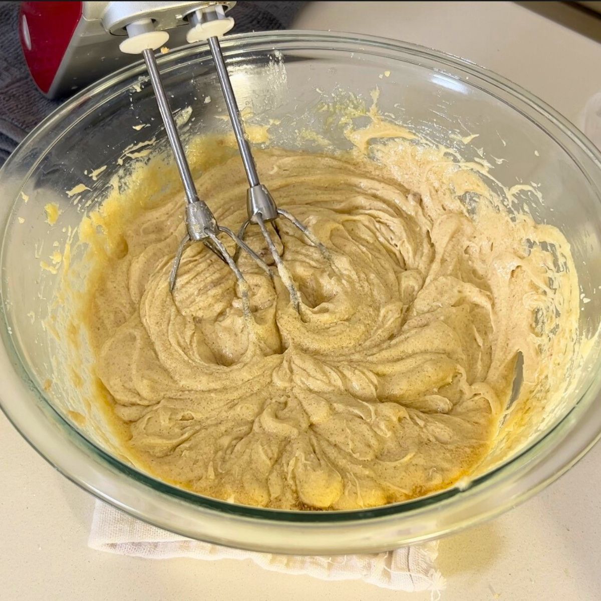 Devils cake batter in a glass bowl.