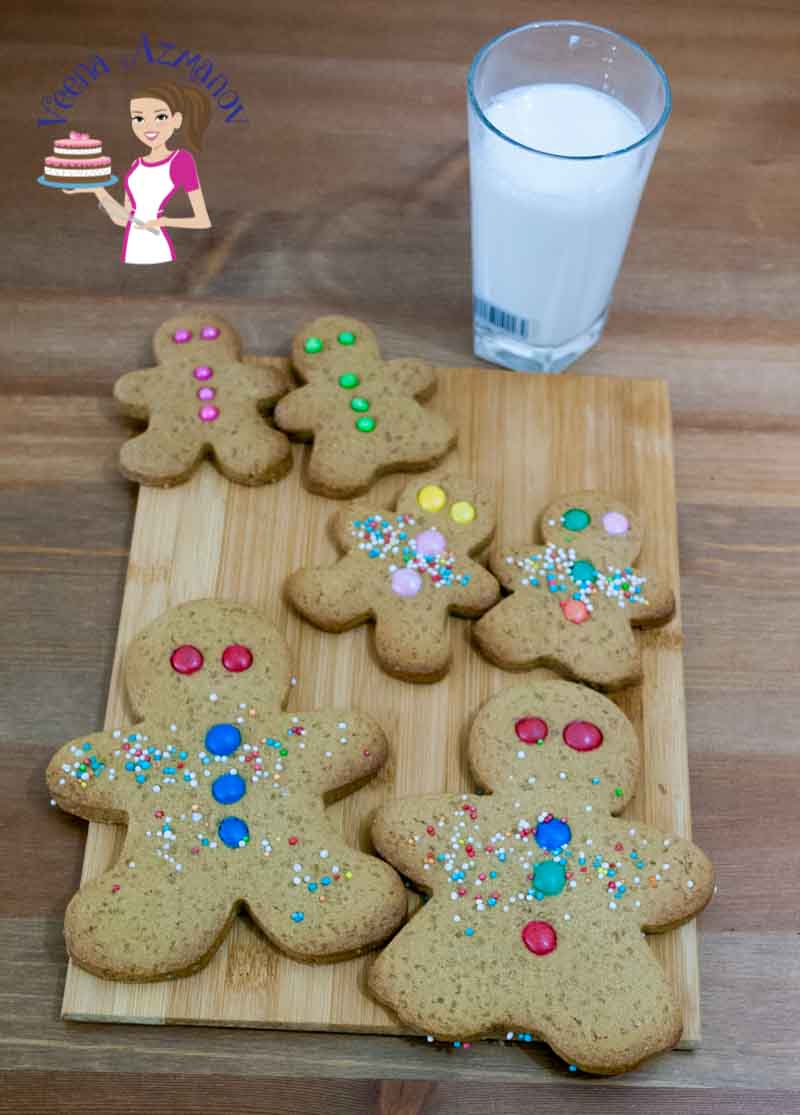 Gingerbread cookies on a wooden board.