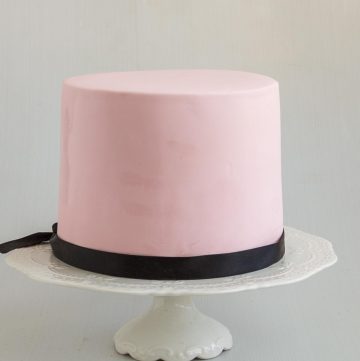 A cake decorated with pink fondant.