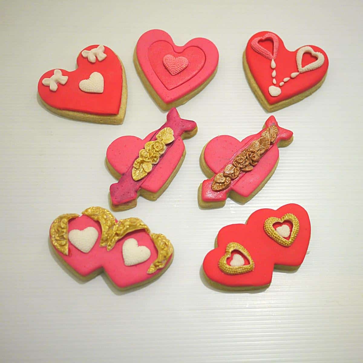 Valentine cookies with rolled royal icing.