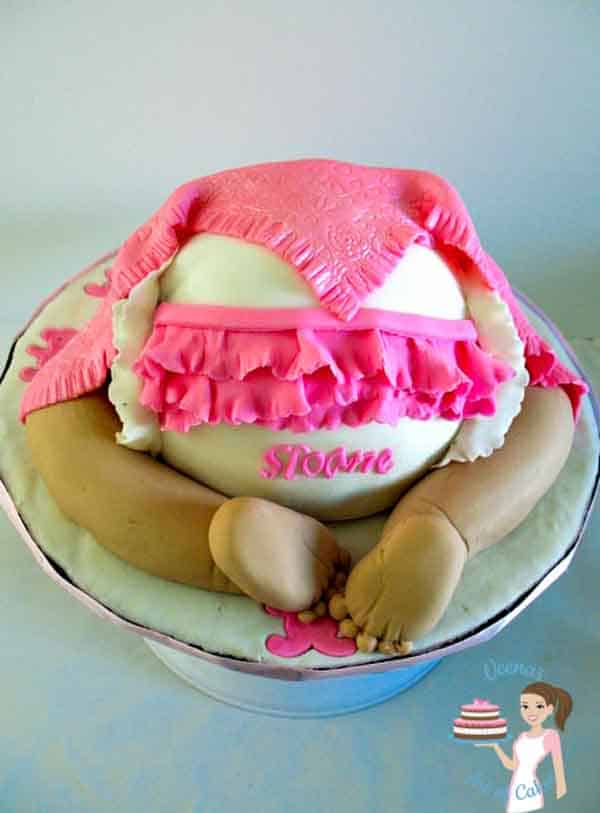 AA cake decorated to look like a baby's bum.