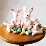 A cake stand with gum paste bunnies.