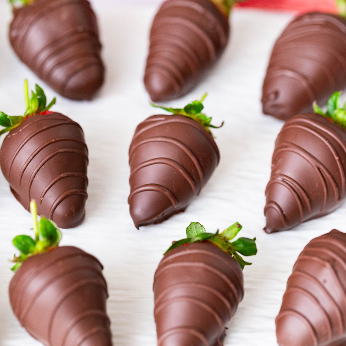 Strawberries covered in milk chocolate.