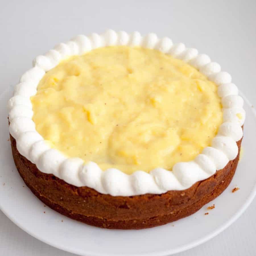 A vanilla layer cake filled with pastry cream filling.