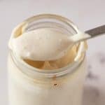 Tahini sauce in a mason jar.