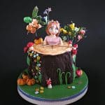 Cake frosted in a fondant with cocoa powder.