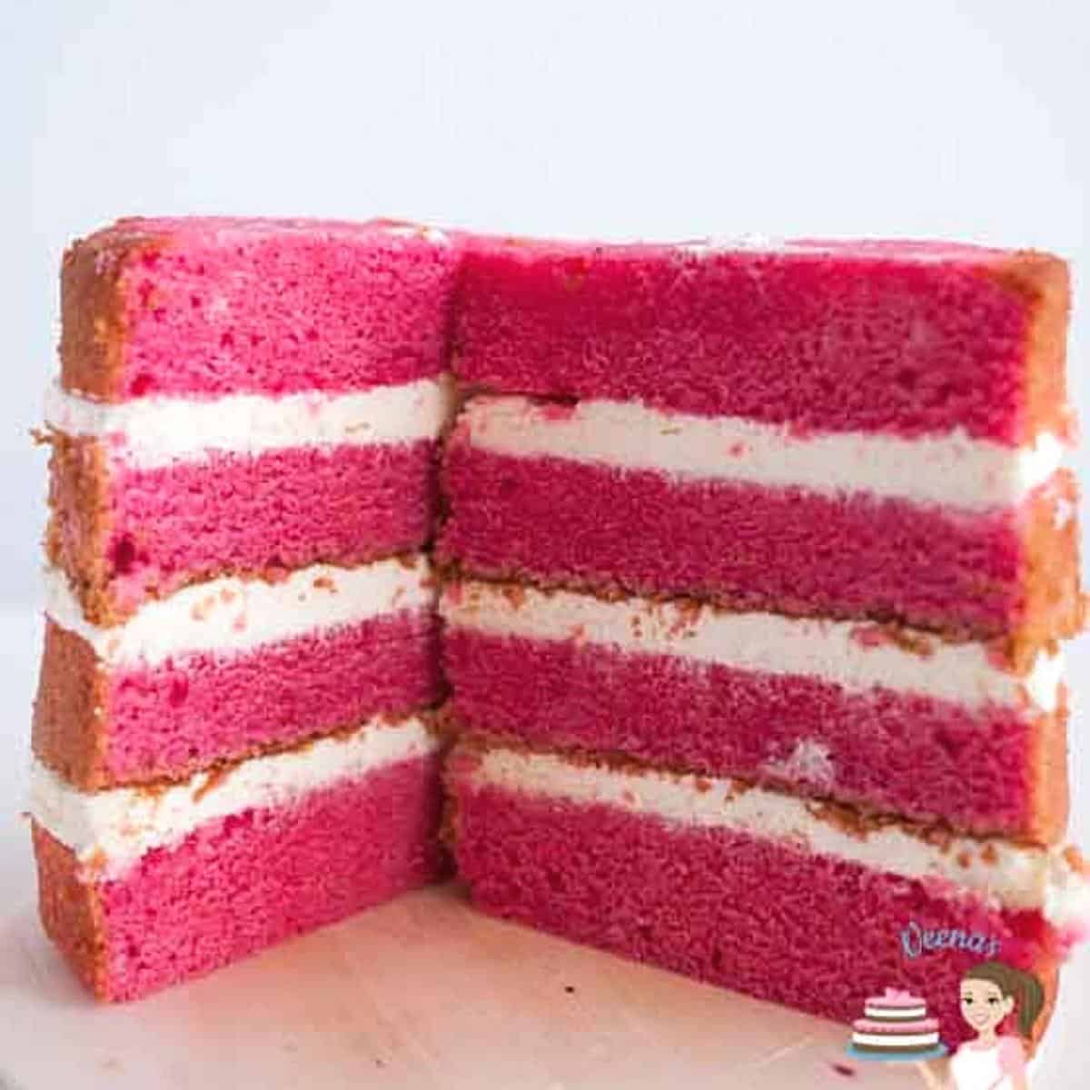 Layers of strawberry cake with Swiss meringue buttercream.