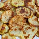 Baked potato chips on a plate.