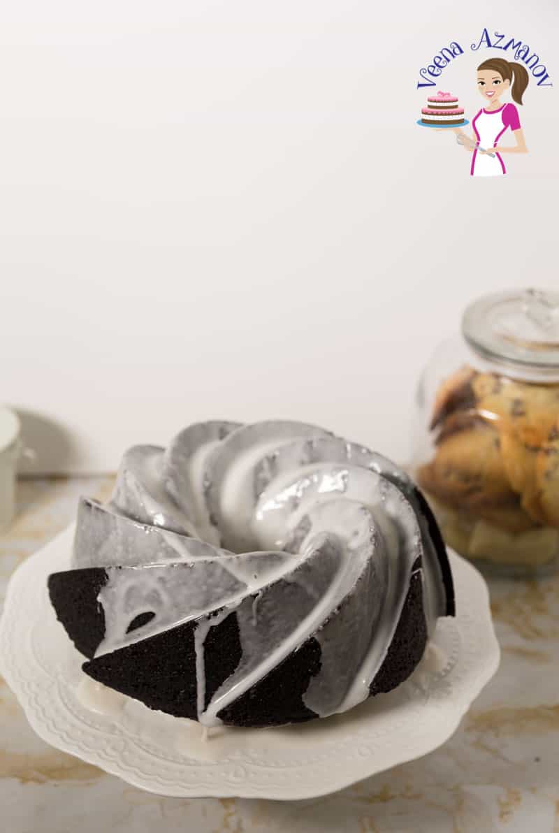 A chocolate bundt cake with vanilla glaze.