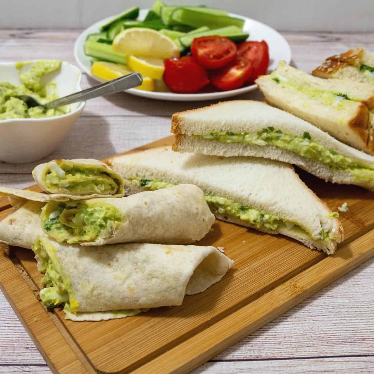 A sandwich wrap with avocado and egg.