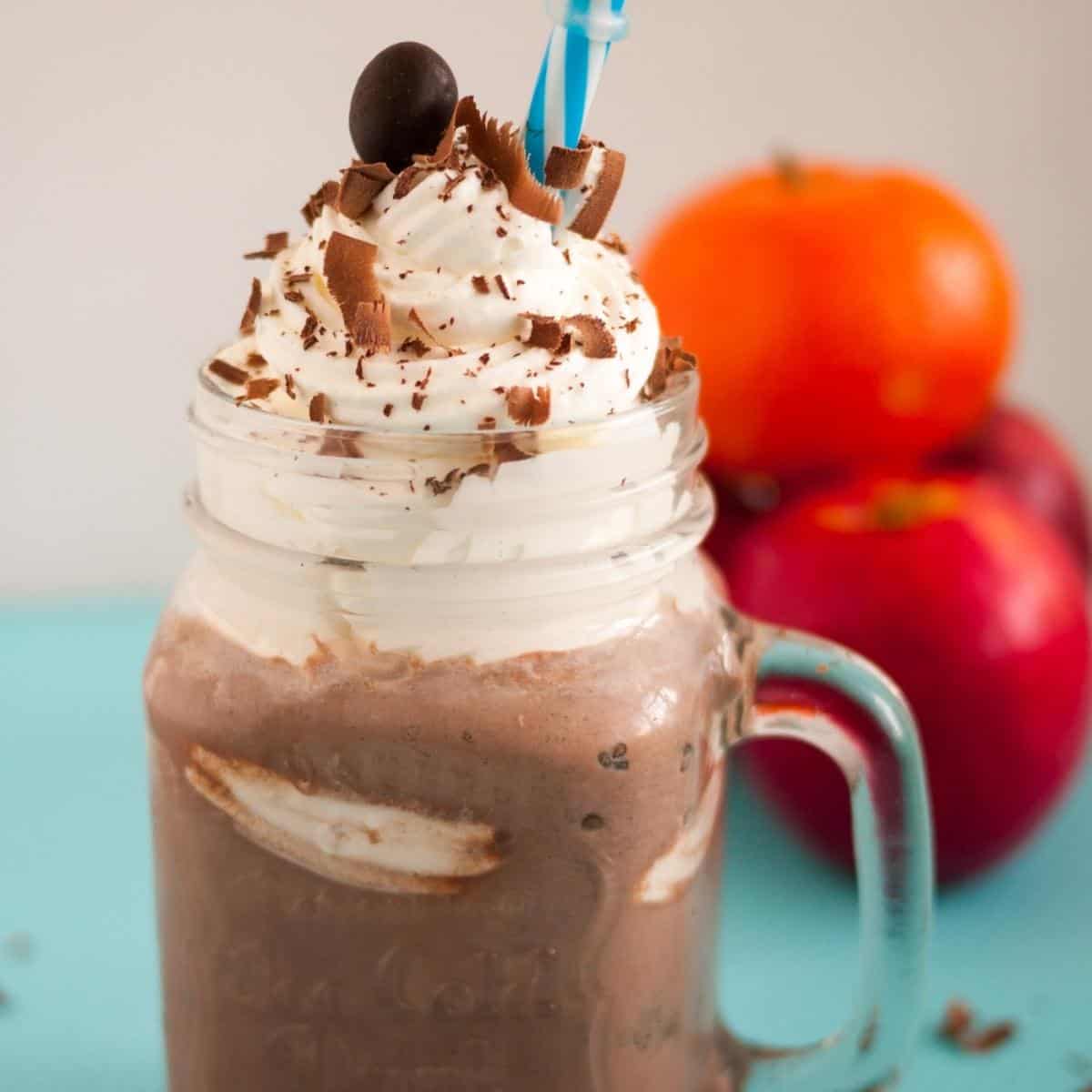 Chocolate drink topped with whipped cream.