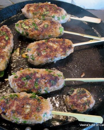 Kebabs on a grill made with ground turkey.