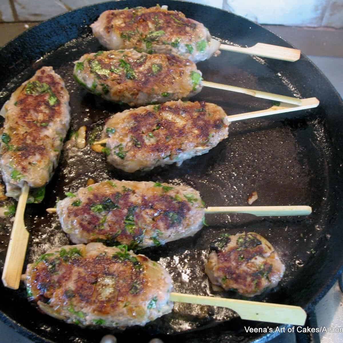 Kebabs on a grill made with ground turkey.