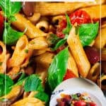 Pinterest image for pasta with cherry tomato, olives, and basil.