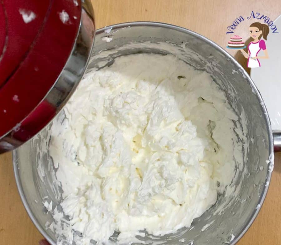 Making buttercream in a stand mixer.