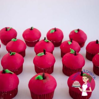 Cupcakes decorated like apples.