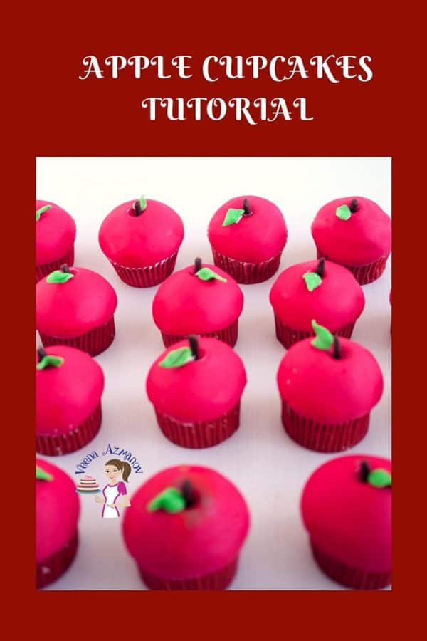 Cupcakes decorated with fondant to look like red apples.