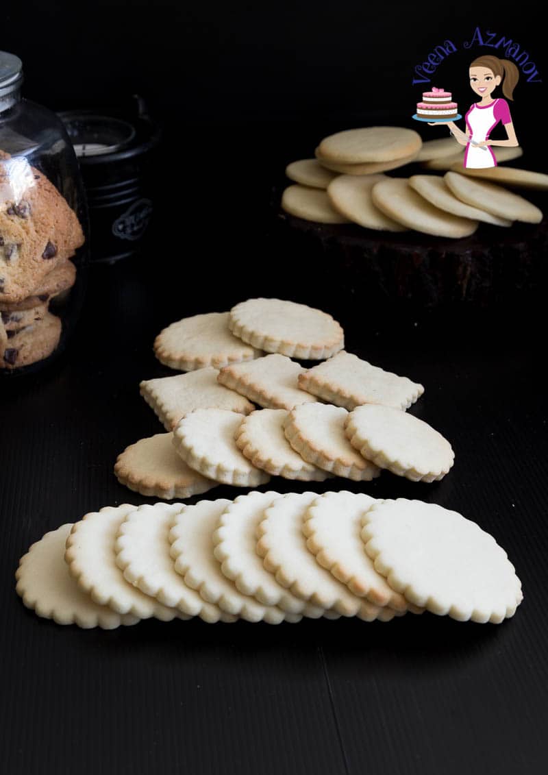 A stack of vanilla sugar cookies on a table.