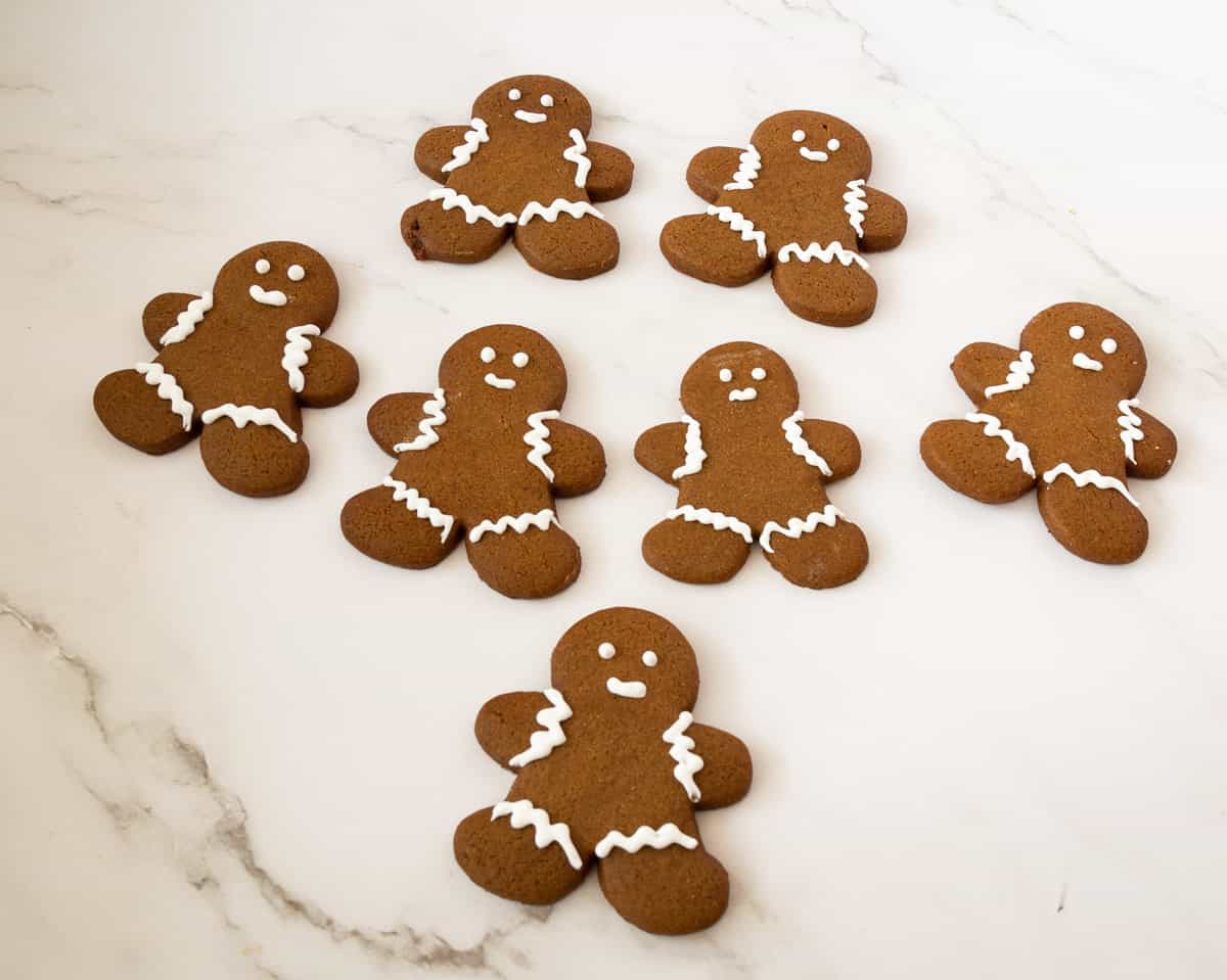 Classic gingerbread frosted cookies on the table.