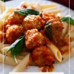 Pinterest image for turkey meatballs over pasta.