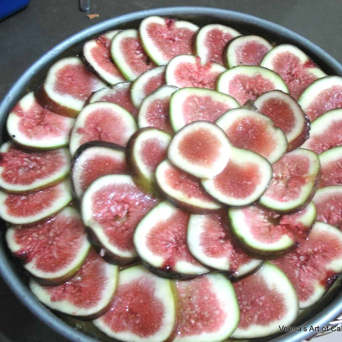 A fig cheesecake in a springform pan.