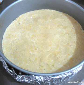 A springform pan with unbaked crust on display